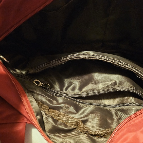 A small shoulder or crossbody purse with a ton of pockets to carry everything! - Picture 13 of 15